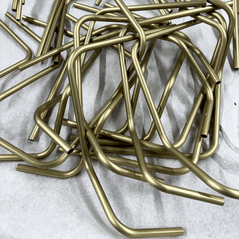 Aluminum tubes with gold a chem-film applied.